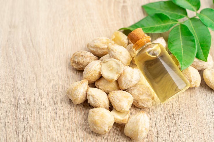 minyak kemiri, rambut rontok pasca melahirkan, kemiri untuk rambut, manfaat kemiri, perawatan rambut alami ibu muda, herbal rambut rontok, solusi rambut sehat alami